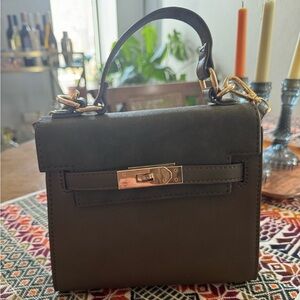 Francesca’s small olive structured handbag